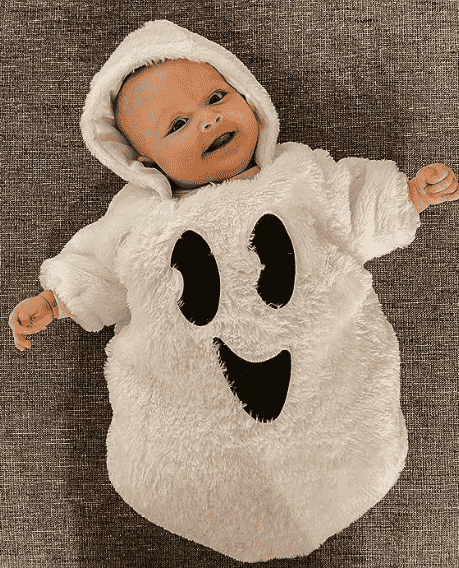 Baby in ghost romper costume.