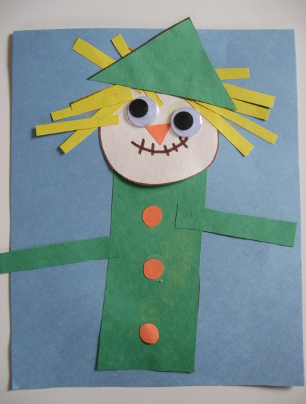 Scarecrow made out of construction paper.