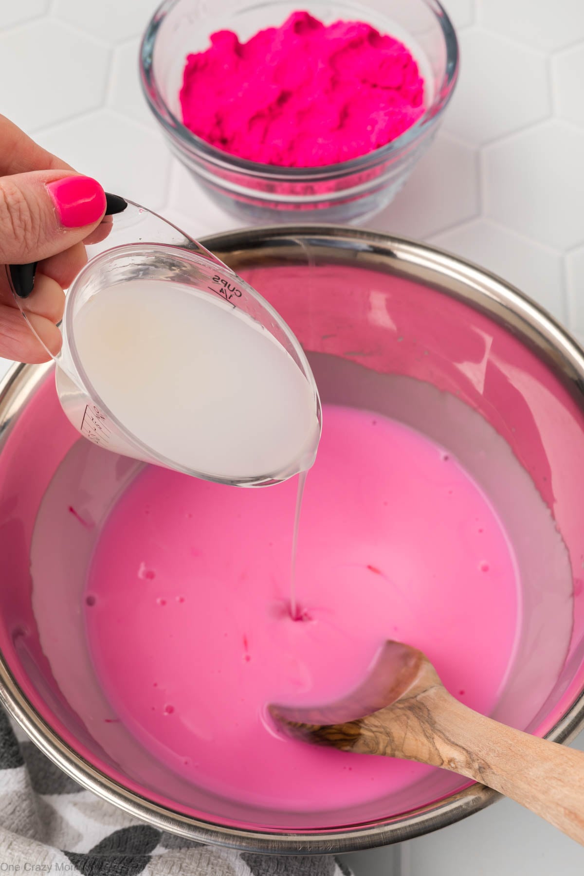 Liquid starch slowly added to the bowl.