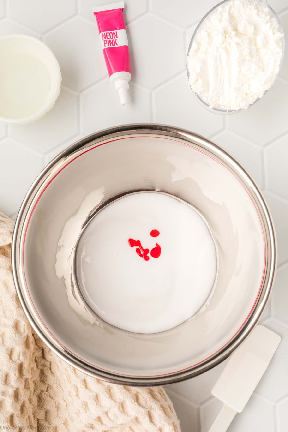 Food coloring drops in bowl.