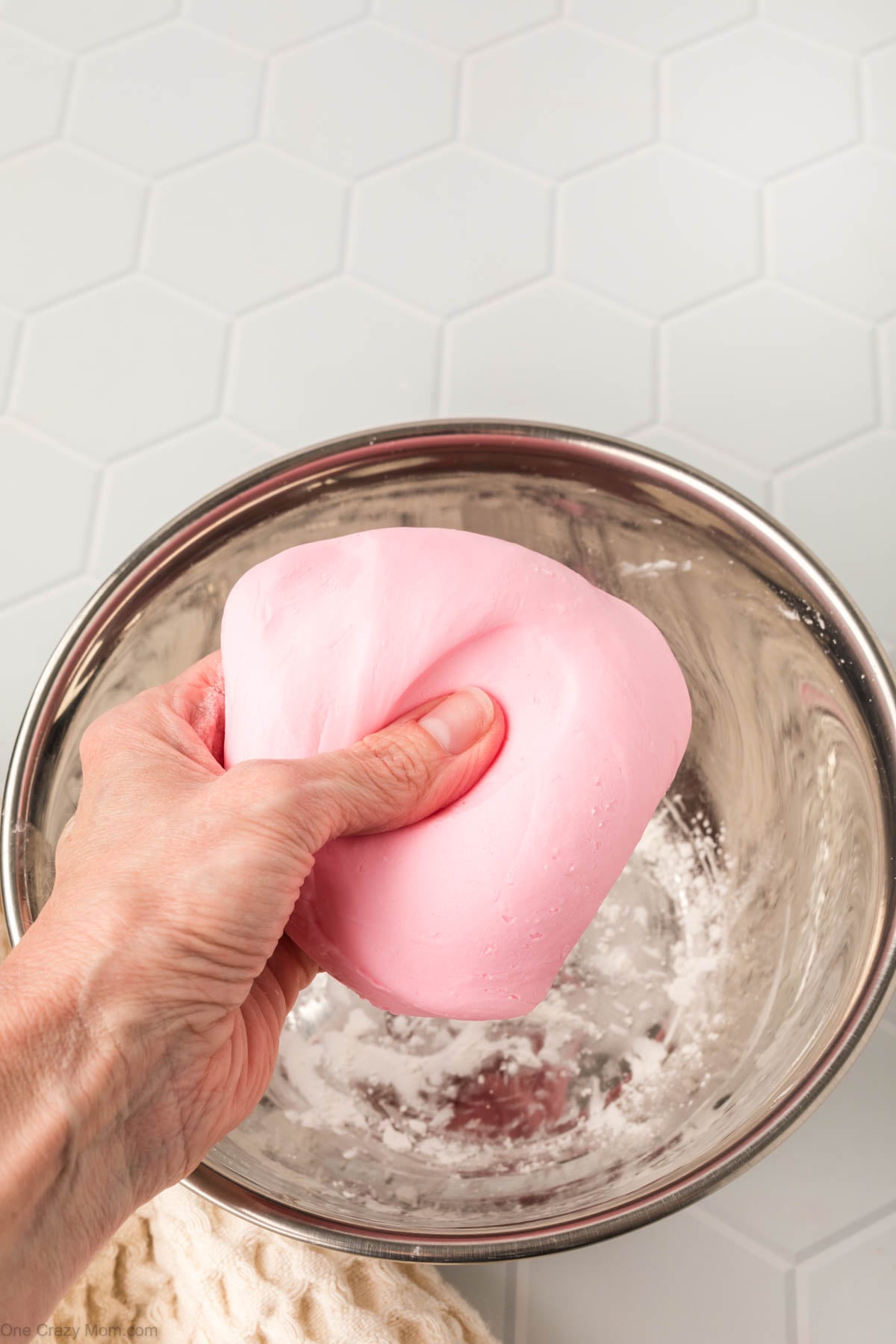 Slime kneaded in hands.