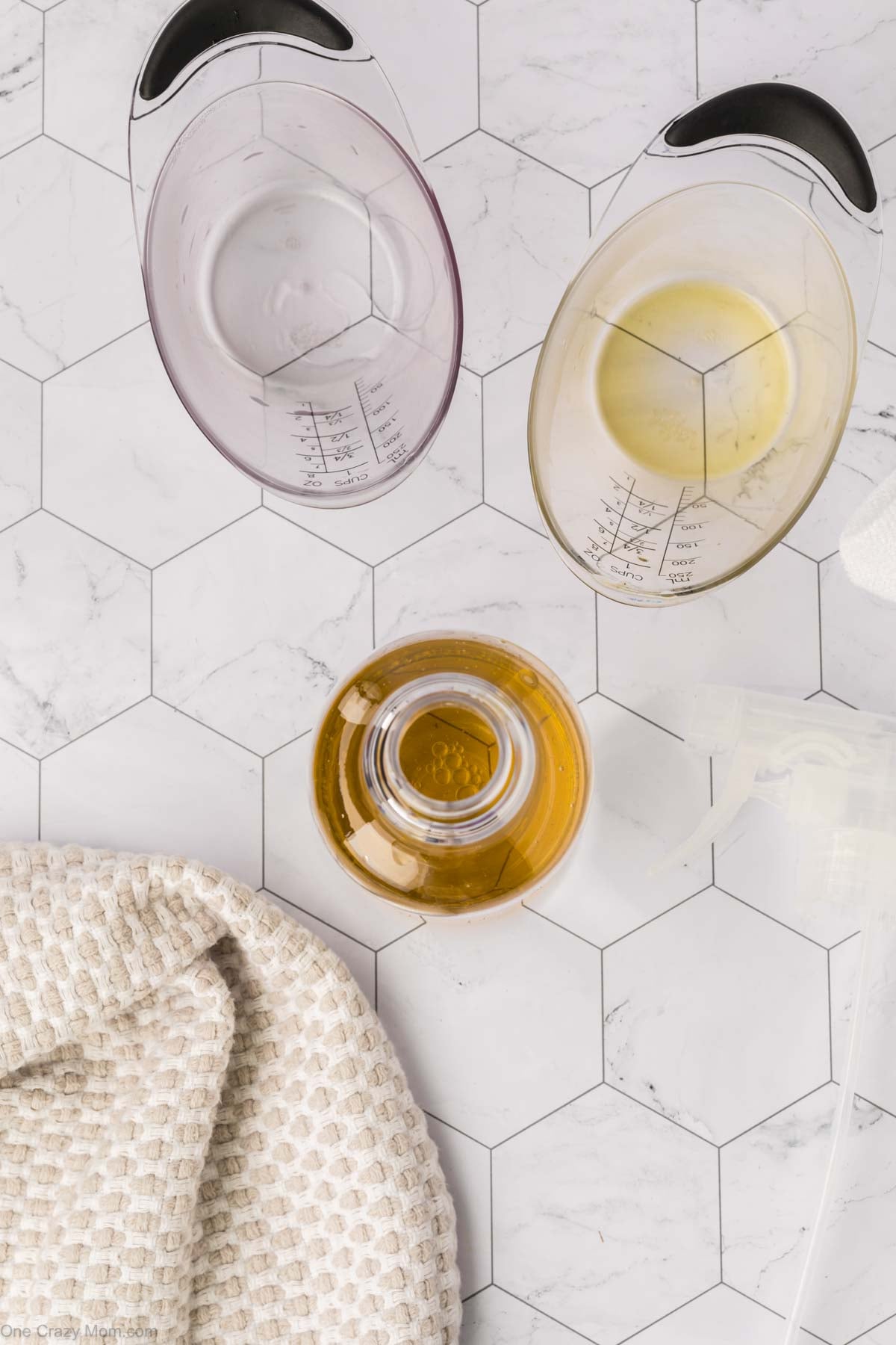 Bottle with items being poured into.