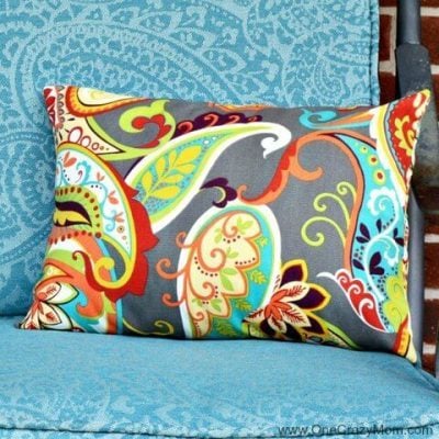 We have over 20 DIY Farmhouse decor ideas that are easy to make. Find lots of ideas that are budget friendly and simple to create for your home. Pillow in chair.