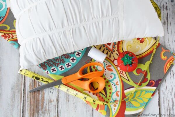 This easy Envelope Pillow Cover one piece is so easy to make! With step my step instructions you can make these easy DIY pillow covers in 30 minutes! Learn how to make a pillow cover. How to make an envelope pillow cover is easy. Supplies for pillow cover - pillow forms, fabric, tape measure, sewing machine.