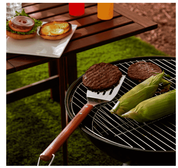 grill spatula holding burger