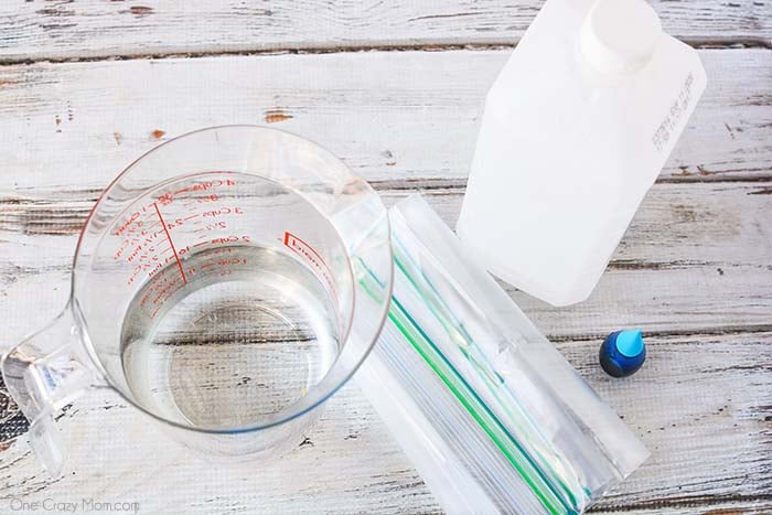 Supplies to make ice pack: water, rubbing alcohol, bags, food coloring.