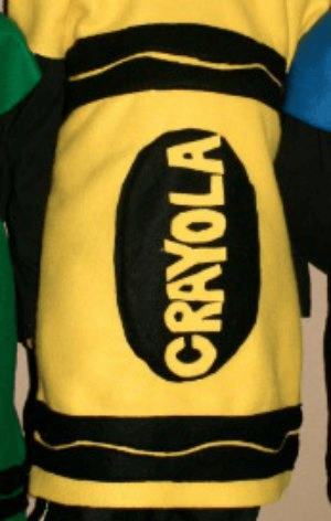 Learn how to make a crayon costume. You can make this homemade crayon costume for only $5! It's so easy to make a Crayola Crayon Costume. Try making this simple Crayon costume DIY. Close up photo of Crayon costume.
