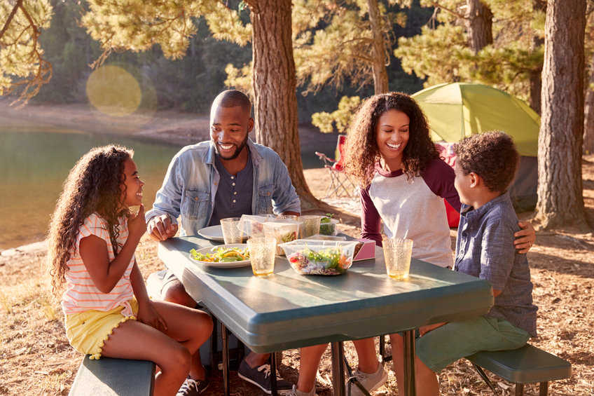 Family at picnic table.