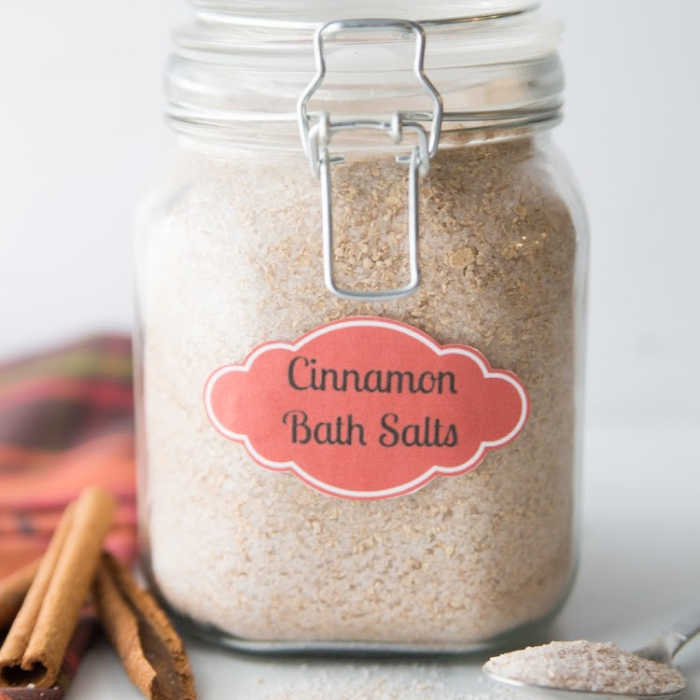Cinnamon Homemade Bath Salts are so easy to make and smell heavenly. Melt all your stress away when you use these decadent diy bath salts. Cinnamon Homemade Bath Salts in glass jar.