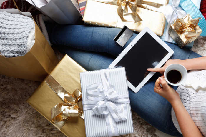 Photo of gifts around a person's lap.