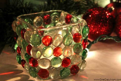 Looking to jazz up your holiday decor on a budget? Try this DIY Dollar Store Christmas Candle Holder that takes only minutes to make and is frugal and easy. Looking to jazz up your holiday decor on a budget? Try this DIY Dollar Store Christmas Candle Holder that takes only minutes to make and is frugal and easy.