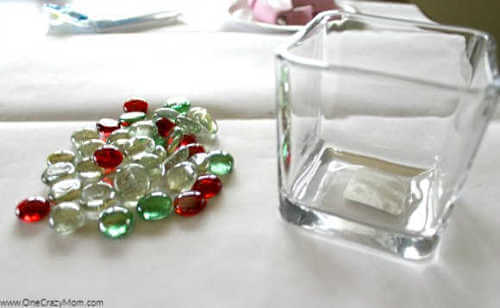 Looking to jazz up your holiday decor on a budget? Try this DIY Dollar Store Christmas Candle Holder that takes only minutes to make and is frugal and easy. Looking to jazz up your holiday decor on a budget? Try this DIY Dollar Store Christmas Candle Holder that takes only minutes to make and is frugal and easy.