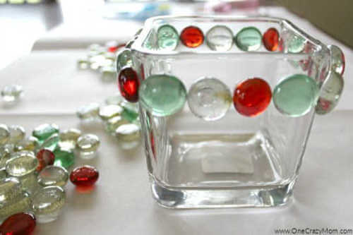Looking to jazz up your holiday decor on a budget? Try this DIY Dollar Store Christmas Candle Holder that takes only minutes to make and is frugal and easy. Looking to jazz up your holiday decor on a budget? Try this DIY Dollar Store Christmas Candle Holder that takes only minutes to make and is frugal and easy.