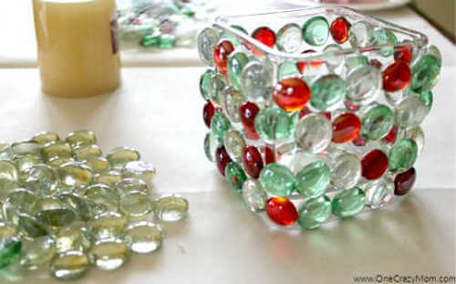 Looking to jazz up your holiday decor on a budget? Try this DIY Dollar Store Christmas Candle Holder that takes only minutes to make and is frugal and easy. Looking to jazz up your holiday decor on a budget? Try this DIY Dollar Store Christmas Candle Holder that takes only minutes to make and is frugal and easy.