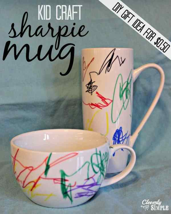 Photo of tall and short mug with sharpie art.
