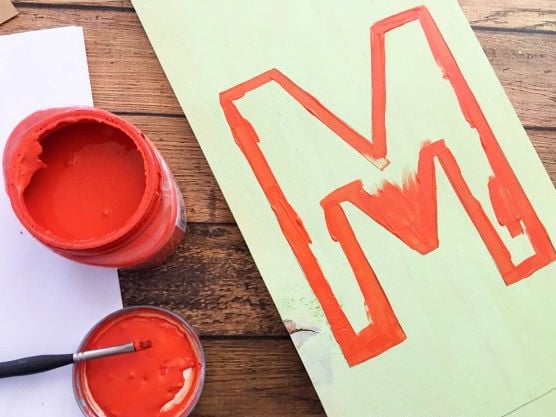 Painting the letters.