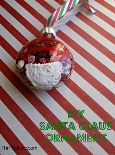 We've rounded up over 30 Easy Homemade Christmas Ornaments. These DIY ornament ideas are simple to make and many use what you already have. Try these fun DIY craft ideas! Your kids will love making these easy handmade ornaments for Christmas! #onecrazymom #christmasornaments #DIYornaments Santa DIY ornament ready to use.