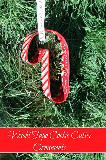 We've rounded up over 30 Easy Homemade Christmas Ornaments. These DIY ornament ideas are simple to make and many use what you already have. Try these fun DIY craft ideas! Your kids will love making these easy handmade ornaments for Christmas! #onecrazymom #christmasornaments #DIYornaments Washi Tape cookie cutter ornament in tree.