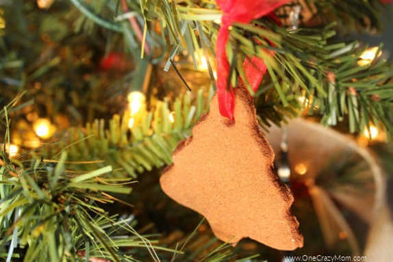 Check out these frugal and creative Christmas gift wrap ideas. Remember, a Christmas gift wrapping idea doesn't have to be hard or expensive. Cinnamon ornament on tree.