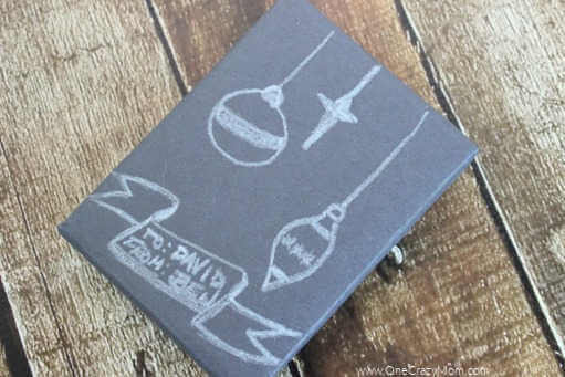 Check out these frugal and creative Christmas gift wrap ideas. Remember, a Christmas gift wrapping idea doesn't have to be hard or expensive. Box wrapped in black paper.