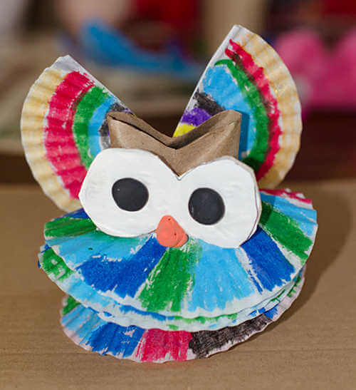 We've rounded up over 30 Easy Homemade Christmas Ornaments. These DIY ornament ideas are simple to make and many use what you already have. Try these fun DIY craft ideas! Your kids will love making these easy handmade ornaments for Christmas! #onecrazymom #christmasornaments #DIYornaments Owl ornament on counter.