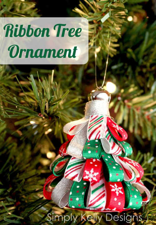 We've rounded up over 30 Easy Homemade Christmas Ornaments. These DIY ornament ideas are simple to make and many use what you already have. Try these fun DIY craft ideas! Your kids will love making these easy handmade ornaments for Christmas! #onecrazymom #christmasornaments #DIYornaments Ribbon tree ornament on tree.