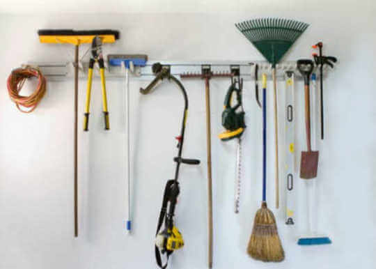 Quick and Easy Organization Ideas that wont' break the bank. These easy home organization ideas will help you get organized quickly and easily. Vertical storage for the garage.