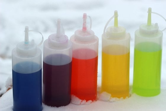 Looking for winter activities for kids? Learn How to make Snow Paint - Snow painting is fun. This is our favorite winter activities for toddlers. Bottles of snow paint in various colors.