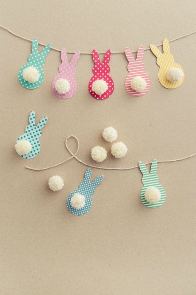 Try some of these quick and easy Easter crafts for kids. The ideas are endless and fun for the entire family. Find 20+ easy Easter crafts. Bunny Garland with pom poms for tails.