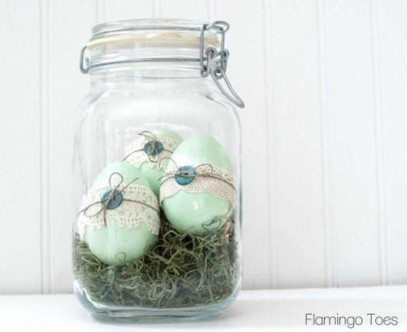 We have 25 Easter egg decorating ideas that are so easy and the kids will love. Gather the family together and make lots of sweet memories with these ideas. Button and lace eggs in glass jar with lid.