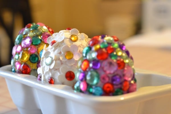 We have 25 Easter egg decorating ideas that are so easy and the kids will love. Gather the family together and make lots of sweet memories with these ideas. Eggs with jewels in egg container.