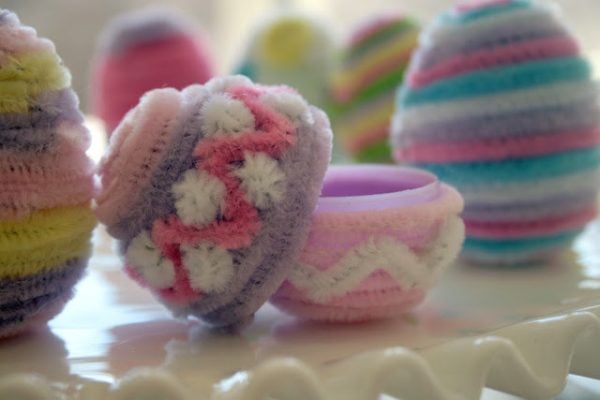 We have 25 Easter egg decorating ideas that are so easy and the kids will love. Gather the family together and make lots of sweet memories with these ideas. Fuzzy eggs with pastel colors.