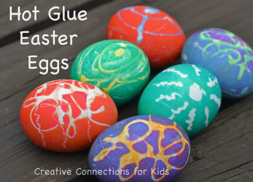 We have 25 Easter egg decorating ideas that are so easy and the kids will love. Gather the family together and make lots of sweet memories with these ideas. Hot Glue Easter Eggs sitting together.