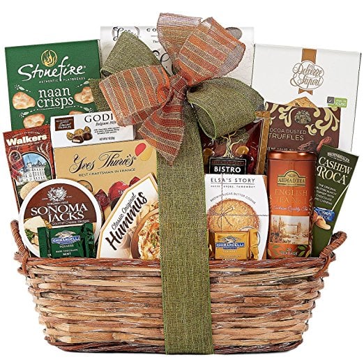 Here are 20 special Mothers day gift basket ideas. This Mother's day pamper mom with one of these mother's day gift baskets. We have the best mothers day gifts sure to make Mom feel loved and appreciated. 20 mother's day gift ideas. Gourmet food gift basket tied with bow.