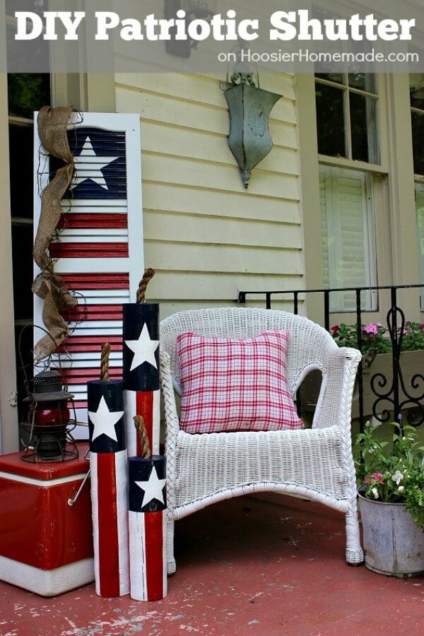 Take a look at these easy 4th of July Front Porch Ideas. Your house will be so festive with these 4th of July front porch decorating ideas. Patriotic front porch ideas for the 4th are simple and easy. Try these 4th of July decorations for the front porch. 12 Easy patriotic decorations for the porch you will love. Chair on front porch beside wooden firecrackers.