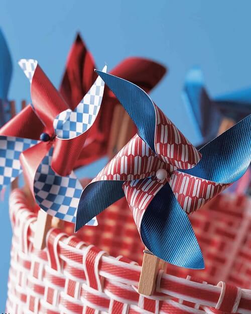 Check out these Fourth of July Crafts. You can make any celebration patriotic with these 4th of July Crafts for your home. Clothespin pinwheel on basket.