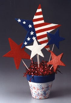 Check out these Fourth of July Crafts. You can make any celebration patriotic with these 4th of July Crafts for your home. Patriotic bouquet in flower pot.