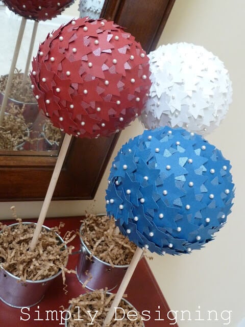 Check out these Fourth of July Crafts. You can make any celebration patriotic with these 4th of July Crafts for your home. Star topiaries in pots.