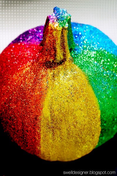 Find 20 no carve pumpkin decorating ideasย the entire family can help with.ย It's so fun to decorate for Fall and what better way than with pumpkins! Pumpkin with rainbow glitter.