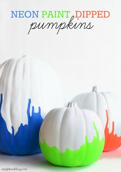 Find 20 no carve pumpkin decorating ideasย the entire family can help with.ย It's so fun to decorate for Fall and what better way than with pumpkins! Neon painted pumpkins grouped together.