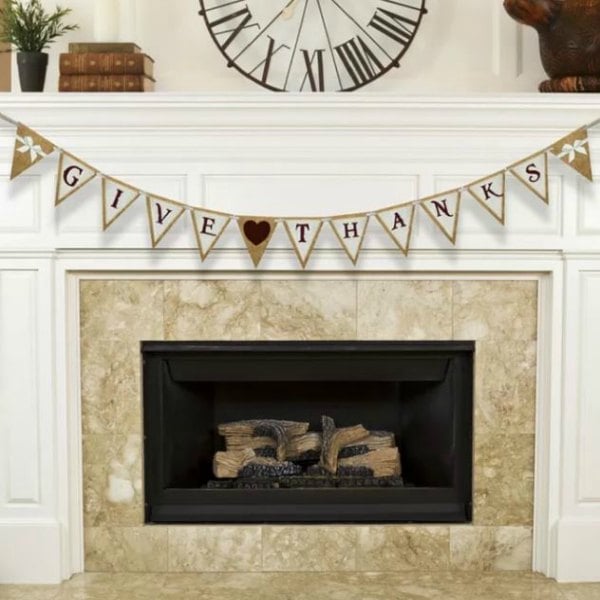 Get inspired with these Thanksgiving home decorations.20 DIY Thanksgiving Decorations you will love.Thanksgiving home decorations that won't bust the budget Give Thanks banner hanging on a fireplace.