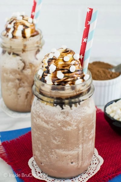 Try these easy hot chocolate recipes for an amazing treat everyone will love this Winter. 20 of the best hot cocoa recipes. You will love these homemade hot chocolate recipes that are made in the crock pot, some with cocoa powder. Learn how to make your own hot chocolate at home! #eatingonadime #hotchocolaterecipes #drinkrecipes #winterrecipes Frozen salted caramel mocha hot chocolate in a mason jar.