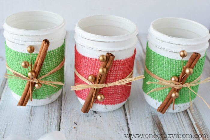 If you're looking for holiday centerpiece ideas,make this rustic Christmas centerpiece.This mason jar Christmas centerpiece is so simple and easy! Mason jars grouped together.