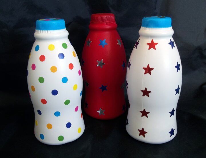 I think you will love these water bottle crafts for kids. These are perfect for keeping the kids busy without breaking the bank! Try 12 water bottle crafts for kids recycled. Your kids are going to love these DIY plastic bottle crafts! #onecrazymom #crafts #craftideas Plastic bottle shakers decorated.