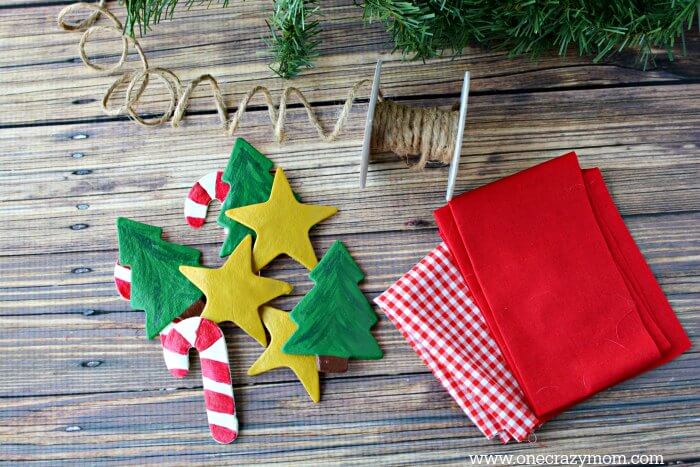Garland makes your home festive for Christmas. DIY Christmas garland is perfect for the mantle or anywhere you need a festive touch. It's so easy to make! Ingredients to make DIY Christmas Garland.