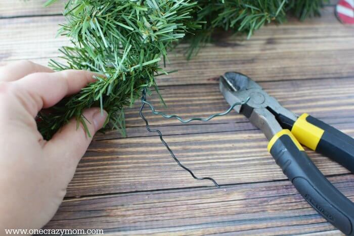 Garland makes your home festive for Christmas. DIY Christmas garland is perfect for the mantle or anywhere you need a festive touch. It's so easy to make! Garland with wire.