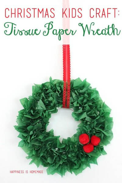 Find Easy Christmas Crafts for kids that are easy to do. They will love these Christmas crafts for kids. 20 Christmas craft ideas for kids that are frugal and great for gifts or ornaments. These fun projects are great for toddlers and older kids too. Perfect for school or for Christmas decorations! #onecrazymom #christmascrafts #kidcrafts Tissue paper wreath with berries.