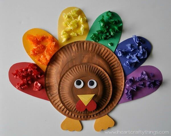 The kids will have a blast wiith these fun and easy Thanksgiving crafts for toddlers. 20 easy Thanksgiving crafts for toddlers they will love. Paper plate turkey with feathers.