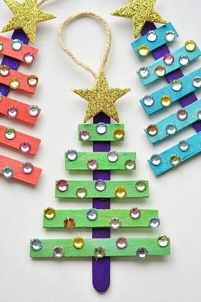 Find Easy Christmas ideas for families here. 20 Fun Christmas activities ideas for kids or toddlers from crafts to games that kids will love. Christmas activities to keep them busy. These are perfect for the classroom too! #onecrazymom #christmasactivities #kidactivities Popsicle tree craft.