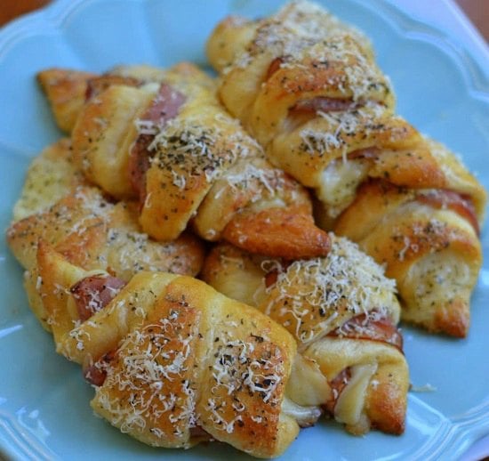 Find the best Super Bowl Snacks kids will love. 25 Easy Superbowl Snacks to please a crowd. Try this Super Bowl Party Food. Super Bowl Party Ideas for kids. Crescents on plate.